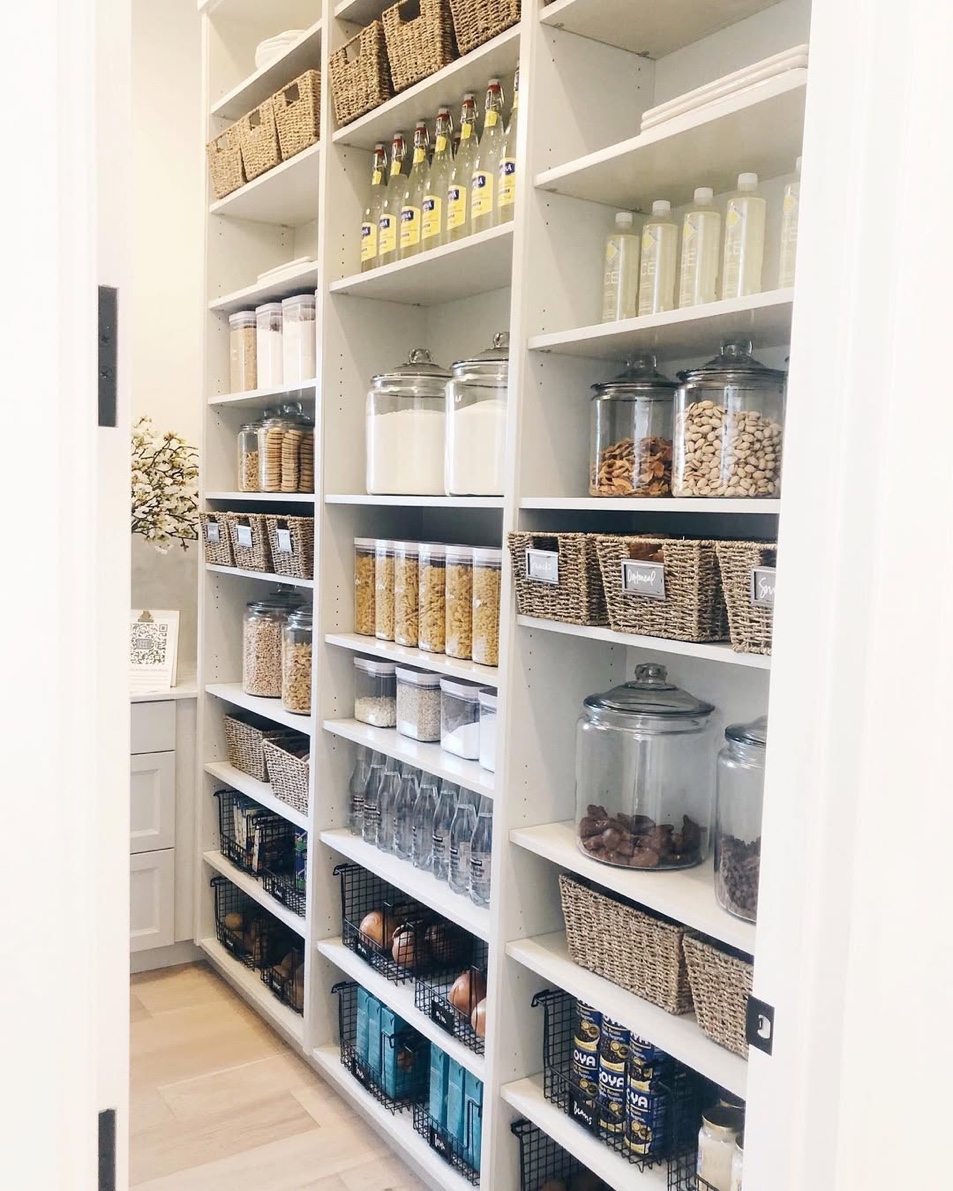 Full wall pantry shelving with woven baskets and glass storage jars, Oyster Bay Long Island