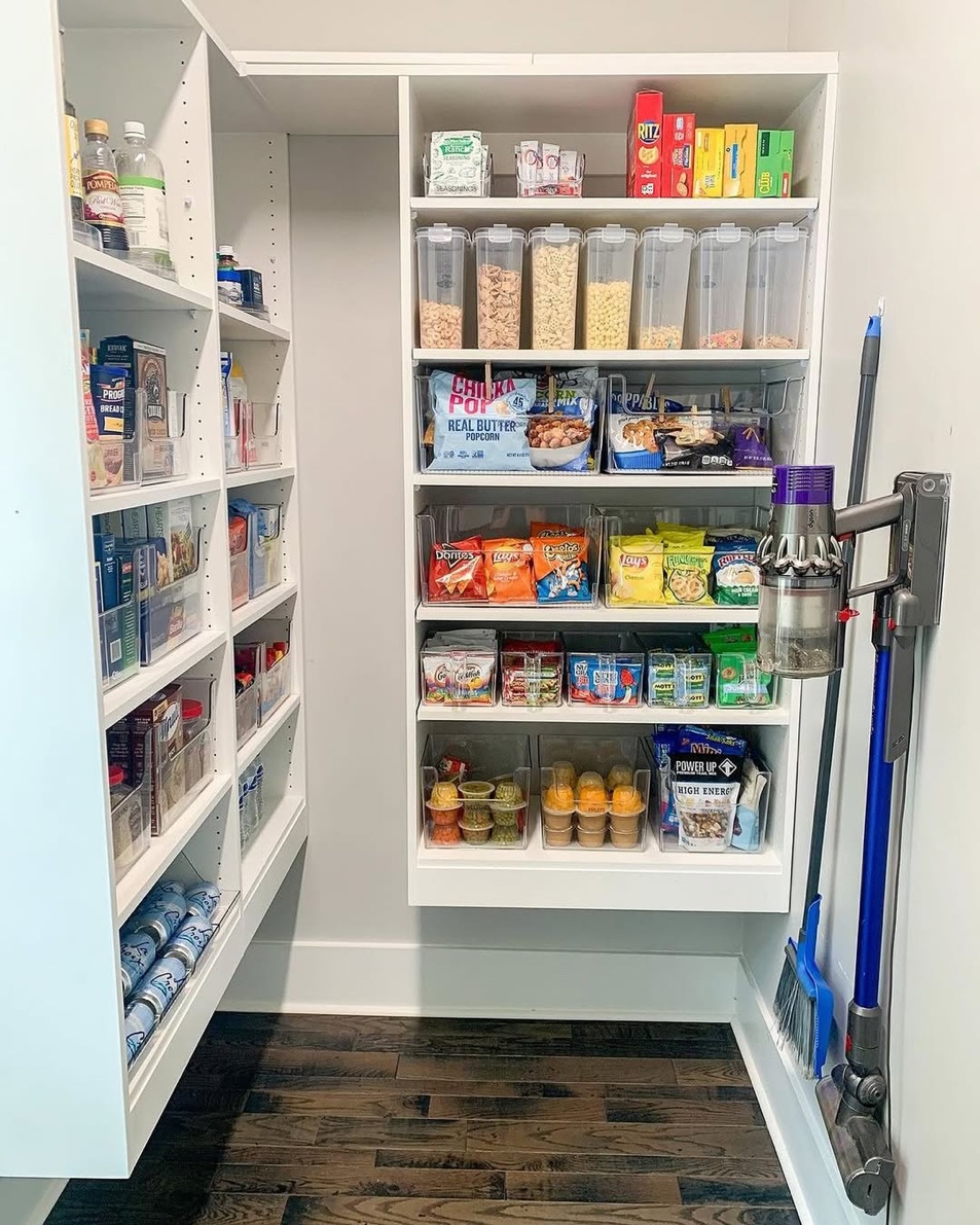 Compact pantry with organized shelves and clear storage bins, Locust Valley Long Island