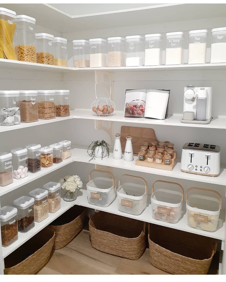 All-white pantry with labeled containers, spice rack, and coffee station, Muttontown Long Island